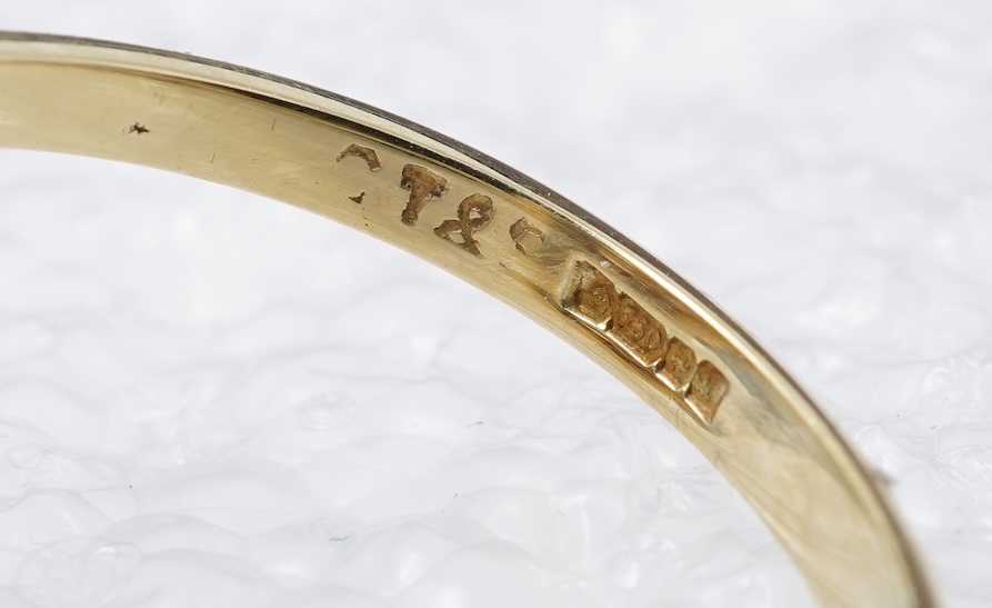 A topaz and diamond cluster ring